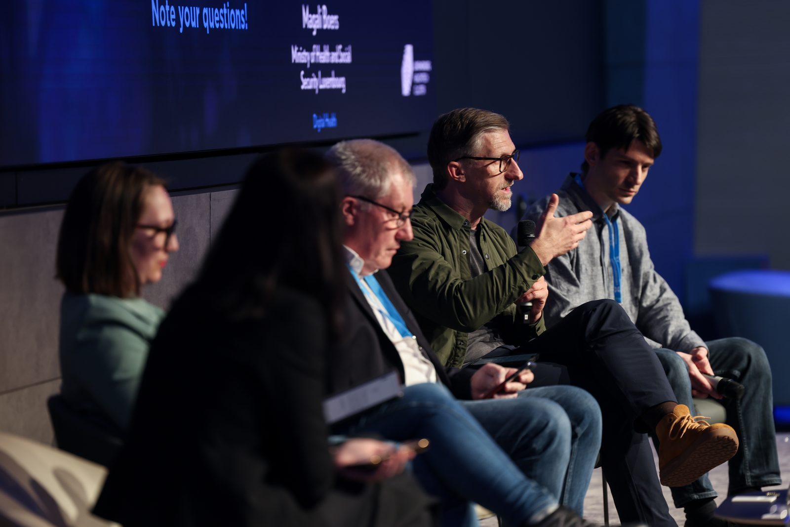 Jan Beger speaking on a conference panel
