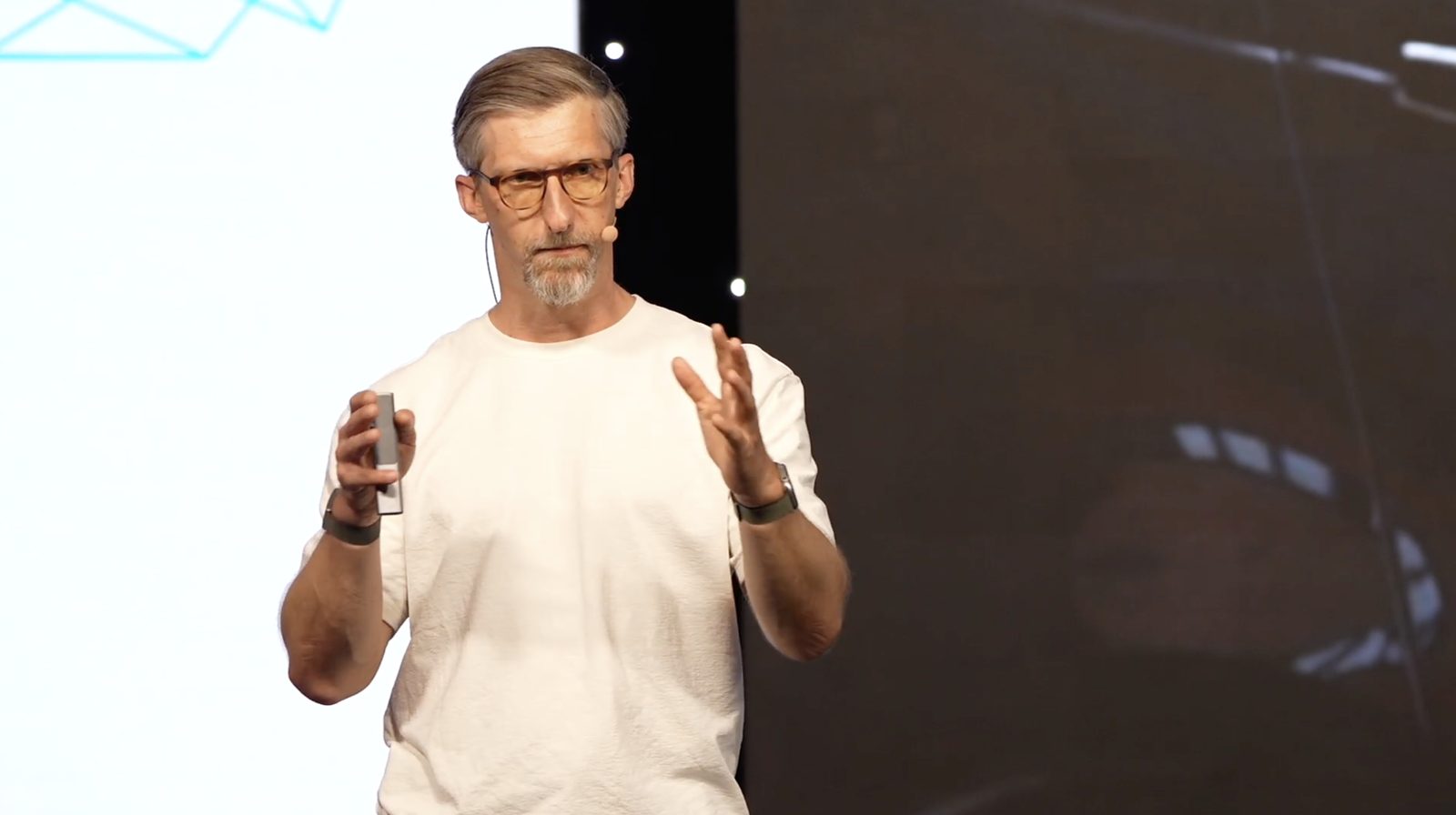Jan Beger speaking on stage at a healthcare AI keynote