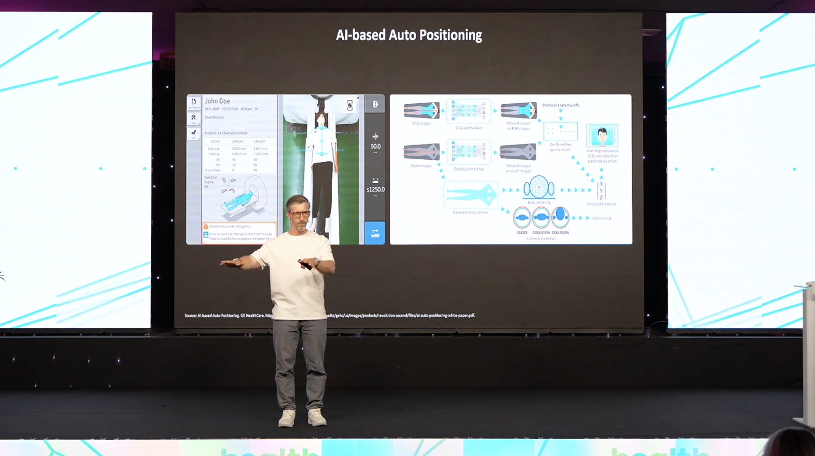 Jan Beger presenting AI-based auto positioning on stage
